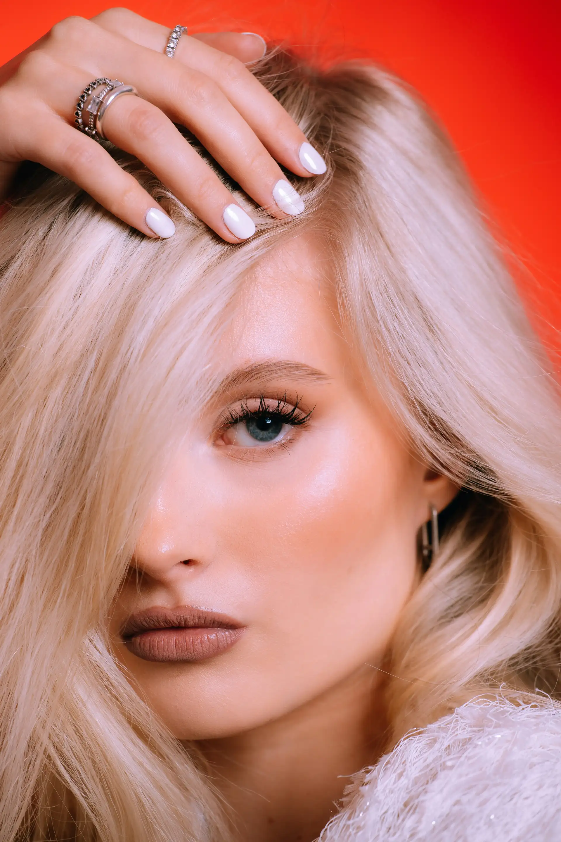 Luxurious styled blowout with bouncy glamorous waves and high volume